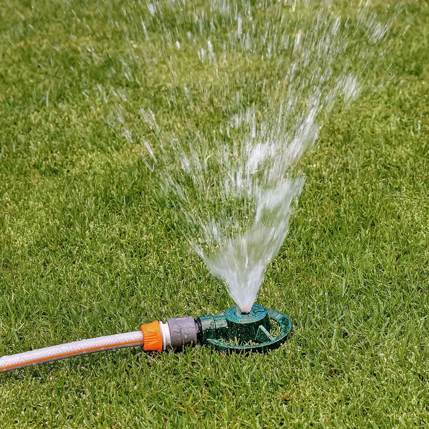 Green Metal Sprinkler